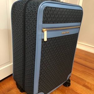 Brand new Michael Kors carry on luggage with tags